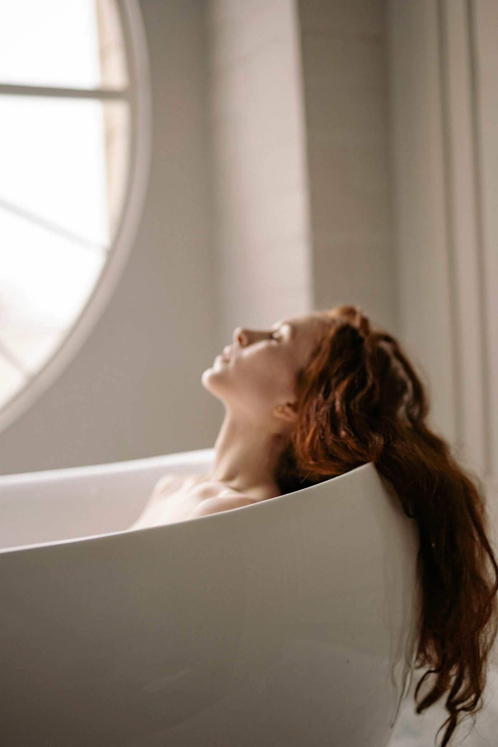 Redheaded Woman in the Bathtub